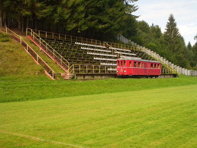 Čierny Balog train running along side of stand