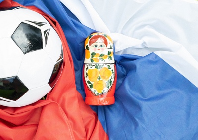 Russia flag, football and doll