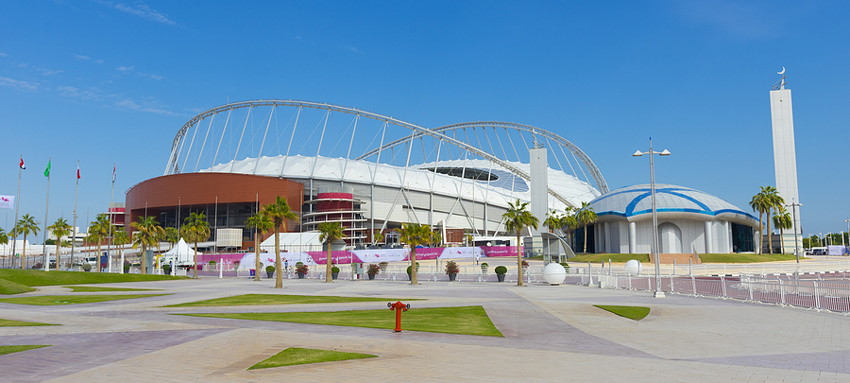 Entrance of Khalifa National Stadium against blue sky in Doha